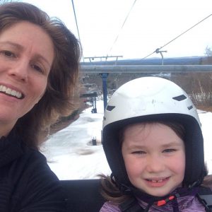 Alyssa Bresnahan on a chairlift with her daughter