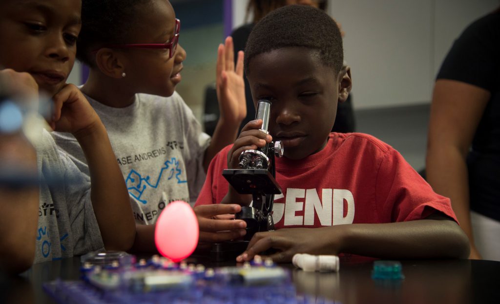 Kids with a microscope