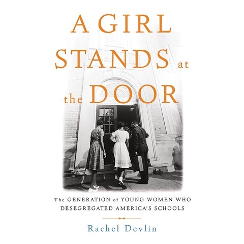 A GIRL STANDS AT THE DOOR