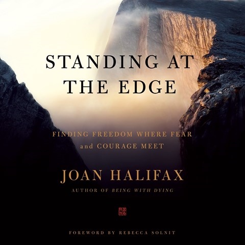 STANDING AT THE EDGE
