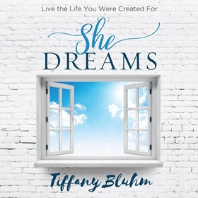 SHE DREAMS